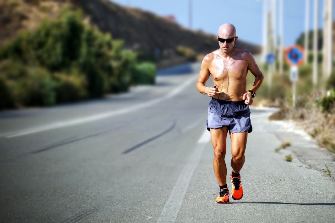 Man running - Hydration, thermoregulation, body temperature and cardiovascular health research at Florida State University Physiology Lab
